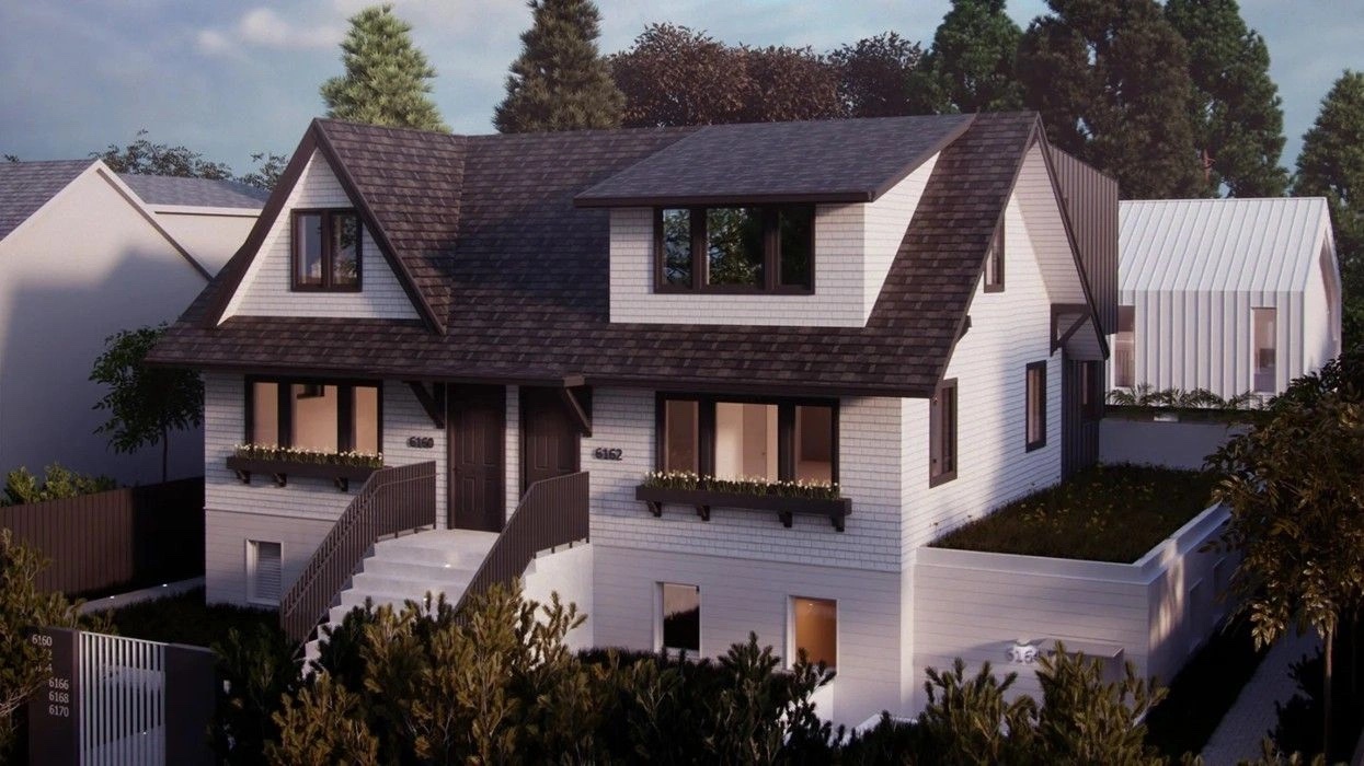 Well-designed multiplex building with architectural details showing quality design that fits into residential neighborhood